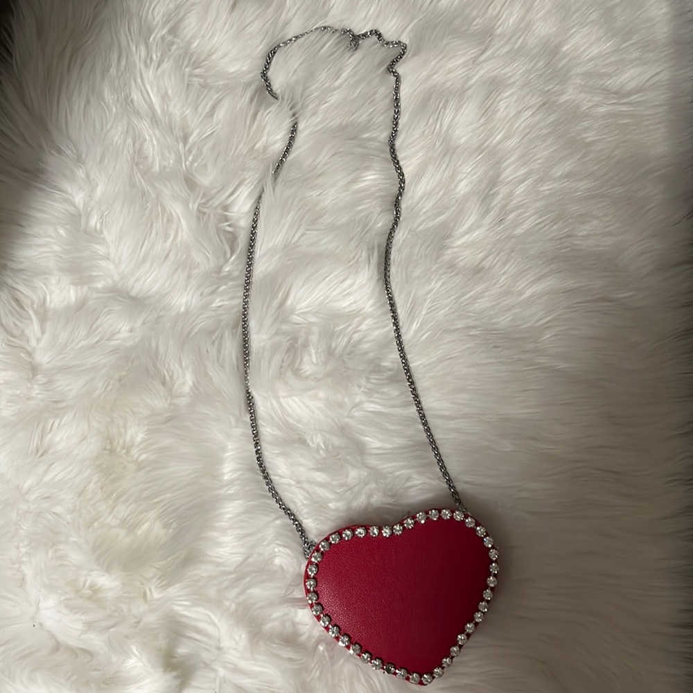 Heart shape purse white rhinestone detailing and silver crossbody chain